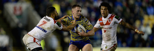 Benji Marshall (left) in action for the Dragons during a pre-season match against the Warrington Wolves in England last month.