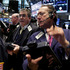 Traders work on the floor of the New York Stock Exchange. File photo / AP