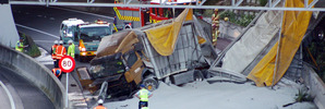 The truck and trailer crashed through a barrier and onto the Southern Motorway. Photo / SNPA
