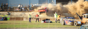 Craig Marsh was seriously injured when his car became airborne and smashed into a safety fence at Auckland's Waikaraka Park last night. Photo / Peter Burling