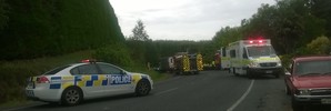 The scene where a person is trapped in a car after it collided with a truck in Whakamarama. Photo/Ruth Keber