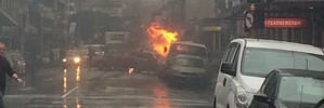 Flames jump from a drilling truck after it caught fire in central Wellington today. Photo / Carl Garrett