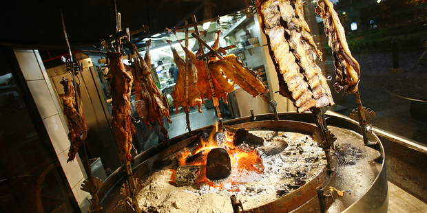 Meat is king in Argentina, whether at barbecue joints or fancy restaurants, where a thick tender rib-eye on the bone is divinely paired with a glass of velvety local Malbec. Photo / Thinkstock