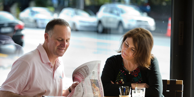 New Zealand Prime Minister and leader of the National Party, John Key, with his wife Bronagh, at their local coffee shop the morning after the general election. File photo / Brett Phibbs