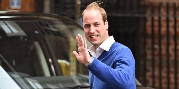Prince William told the crowds he was very happy as he headed off to pick up Prince George. Photo / Getty Images
