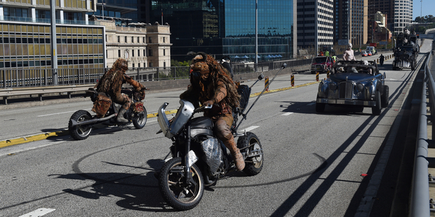 Mad Max: Fury Road film a promo on the Cahill Express in Sydney. Photo / AAP ONE