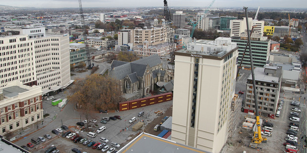 Aerial view of cranes and the rebuilding of earthquake damage buildings around Cathedral Square. Photo / Geoff Sloan