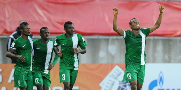 Nigeria's Saviour Godwin celebrates after scoring against North Korea. Photo / AP