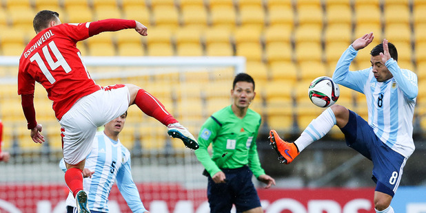 Bernd Gschweidl of Austria and Leonardo Rolon of Argentina compete for the ball in their 0-0 U-20 FIFA World Cup draw this afternoon. Photo / Getty Images