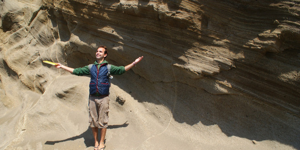 Researcher Ben Moorhouse, pictured here at Cape Wanbrow near Oamaru, has revealed the bizarre history of ancient eruptions from different volcanoes over millions of years apart. Photo / supplied