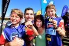 Tauranga's Matt and Kylie Potton were proud of their children Willow (left) and Heath who toiled through the heat to finish in yesterday's Weet-Bix Kids TRYathlon. Photo / George Novak Tauranga's Matt and Kylie Potton were proud of their children Willow (left) and Heath who toiled through the heat to finish in yesterday's Weet-Bix Kids TRYathlon. Photo / George Novak