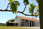 The smart profile of Crossroads winery and some of the grapes beginning to look very nice on the vines. Photo / Warren Buckland The smart profile of Crossroads winery and some of the grapes beginning to look very nice on the vines. Photo / Warren Buckland