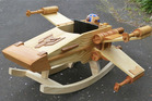 This X-wing starfighter is really a child's rocker Star Wars style. This X-wing starfighter is really a child's rocker Star Wars style.