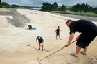 Hawke's Bay BMX Club members John Smith (right), Russell McKay (centre) and Lochie Short tend to limestone on the new BMX track in Romanes Drive, Havelock North. Photo / Warren Buckland Hawke's Bay BMX Club members John Smith (right), Russell McKay (centre) and Lochie Short tend to limestone on the new BMX track in Romanes Drive, Havelock North. Photo / Warren Buckland