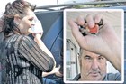 HASTE: Sara Skeet and Brian Hunter try to evade media attention outside Napier District Court yesterday.PHOTO/DUNCAN BROWN HASTE: Sara Skeet and Brian Hunter try to evade media attention outside Napier District Court yesterday.PHOTO/DUNCAN BROWN