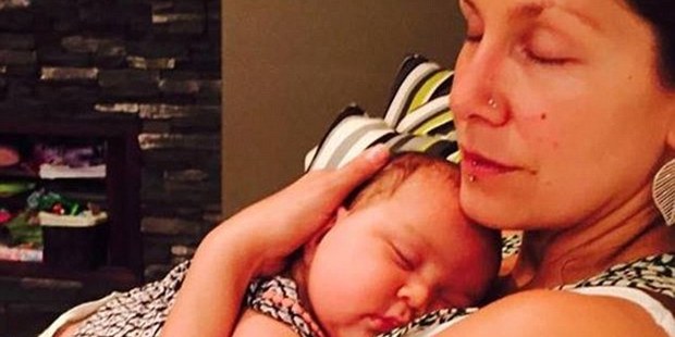 Pictured with her Canadian mother Alana Madill who died in the car accident, Ayla will suffer ongoing disabilities. Photo / Facebook