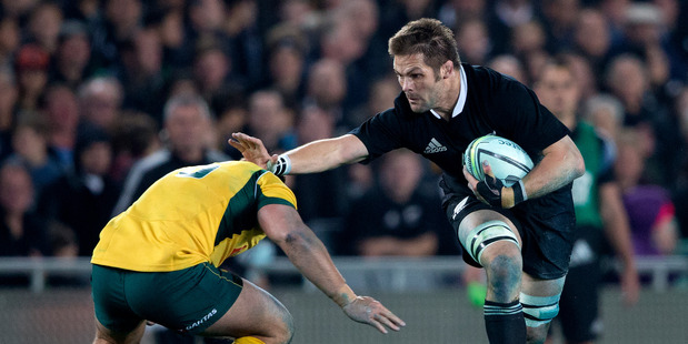Loading All Blacks captain Richie McCaw in action against Australia. Photo / Brett Phibbs.