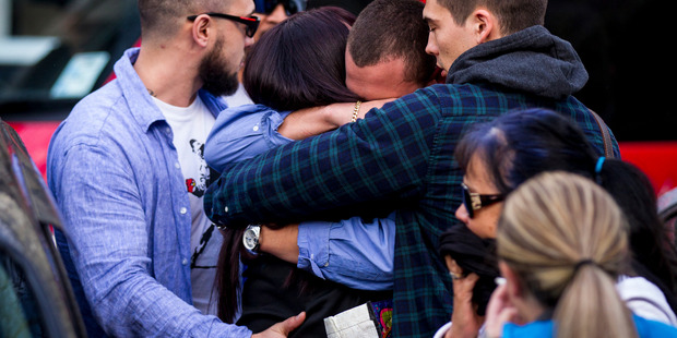 Friends and family of Connor Morris leave the Auckland High Court. Photo / Dean Purcell