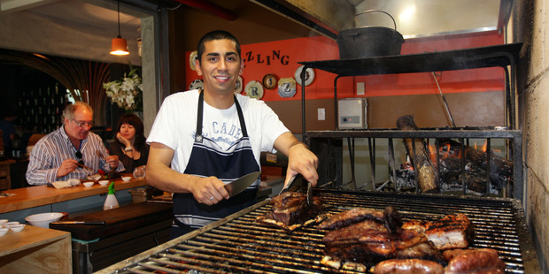 Pictured is Gonzallo Barros at Sizzling Chorizo. Photo /  Doug Sherring