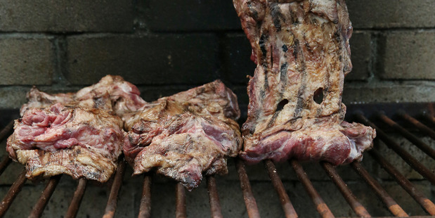Chef Sven Nielsen cooking on the barbecue at Molten Restaurant. Photo / Herald on Sunday