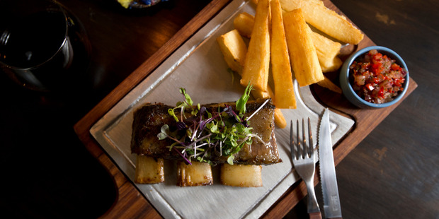 The short ribs with cassava wedges and salsa criolla at El Humero. Photo / Jason Oxenham