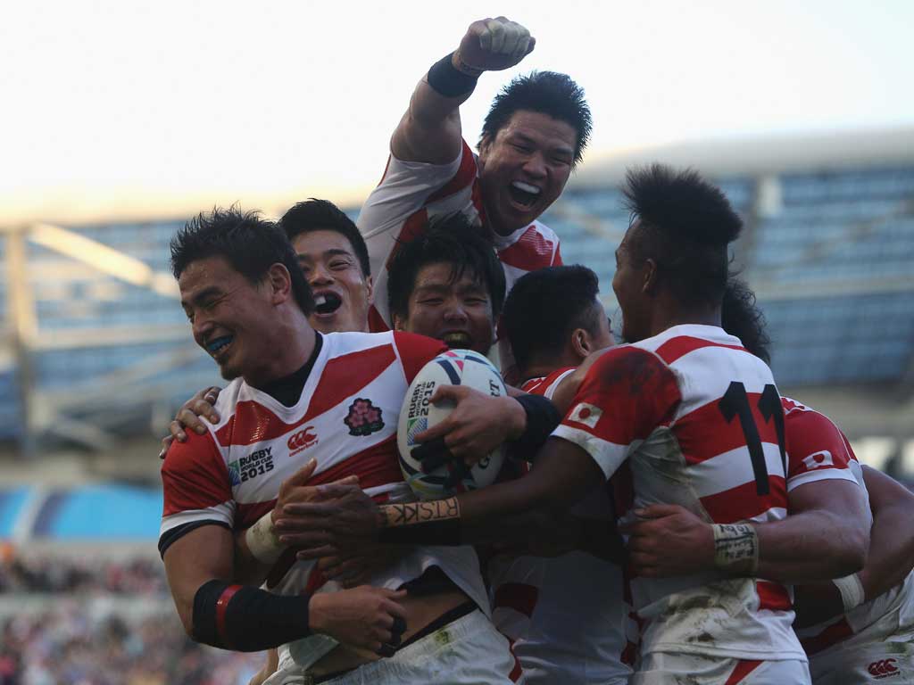 Ayumu Goromaru of Japan celebrates scoring his team's second try during the 2015 Rugby World Cup Pool B match between South Africa and Japan. Photo / Getty Images.