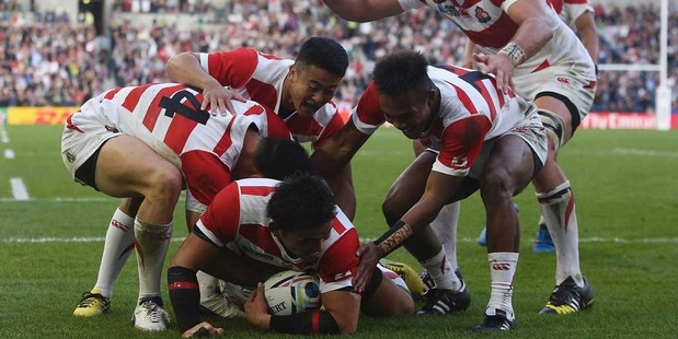 Ayumu Goromaru of Japan celebrates scoring his teams during the 2015 Rugby World Cup Pool B match between South Africa and Japan. Photo / Getty Images.
