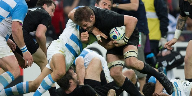 Loading All Blacks captain Richie McCaw drives forward against Argentina. Photo/NZ Herald Brett Phibbs