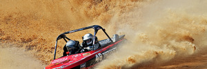 Water sprays out behind Teng Tools, driven by Baden Gray, at ASB Baypark today. PHOTO/ANDREW WARNER