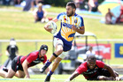 Bay of Plenty star Mason Walker leaves two Canterbury defenders trailing in his wake at the Bayleys Sevens Nationals in Rotorua. Photo / Ben Fraser Bay of Plenty star Mason Walker leaves two Canterbury defenders trailing in his wake at the Bayleys Sevens Nationals in Rotorua. Photo / Ben Fraser