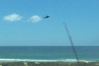The Northland Emergency Services Trust (NEST) helicopter arrives at Takou Beach where a woman drowned after getting into difficulty in the water while boogie boarding with her partner. PHOTO/SUPPLIED
The Northland Emergency Services Trust (NEST) helicopter arrives at Takou Beach where a woman drowned after getting into difficulty in the water while boogie boarding with her partner. PHOTO/SUPPLIED