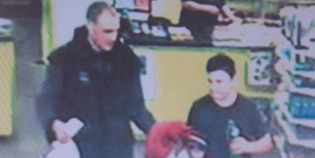 A CCTV image of Alex Fisher with his brother, Eric, the night before he was reported missing. Photo / Supplied