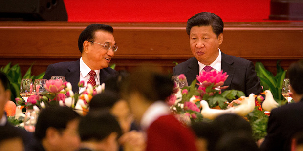 Premier Li Keqiang (left) didn't make Bloomberg's Markets 50 Most Influential list, but President Xi Jinping came in at number two. Photo / AP