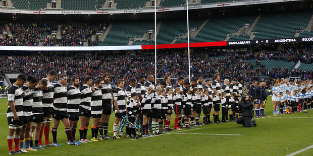 The two teams observed a moment of silence in memory of Jonah Lomu. Photo / Getty