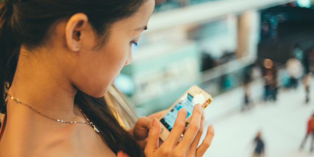 Free WiFi in stores and phishing scams can compromise your cyber security while Christmas shopping. Photo / Getty