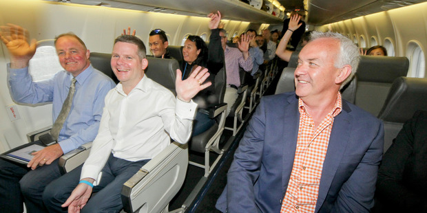 Criag Foss, David Hall, Grant Kerr on the Jetstar flight from Napier to Auckland. Photo / Warren Buckland