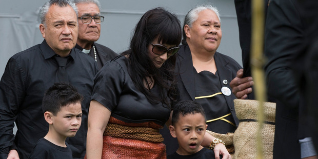 Jonah Lomu's wife Nadene Lomu with sons Dhyreille and Brayley are supported by her parents at Eden Park. Photo / Brett Phibbs