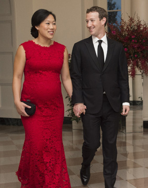 Mark Zuckerberg, Chairman and CEO of Facebook and his wife, Priscilla Chan, arrive for a State Dinner hosted by US President Barack Obama for Chinese President Xi Jinping.