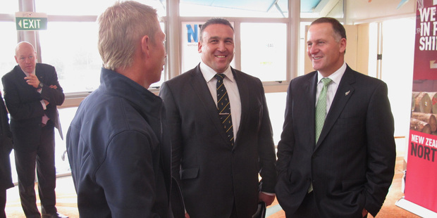 Mike Sabin and Prime Minister John Key mix with voters in 2013. Photo / Northern Advocate