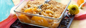 A peach crisp pudding is just one of many delicious ways to use up homegrown peaches.