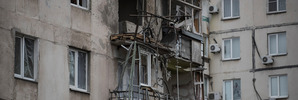 Indiscriminate rocket fire slammed into a market, schools, homes and shops in Eastern Ukraine, killing 30. Photo / AP