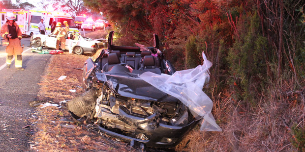 The wrecked car that hurtled up to 50 metres along the highway after colliding with another vehicle. Photo / Supplied