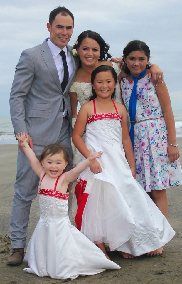 It was Pauline Bradley's love for her family - husband Justin and daughters Alicia, 11, Sienna, 10, and Aria, 2 - that spurred her to fight on. Photo / Supplied