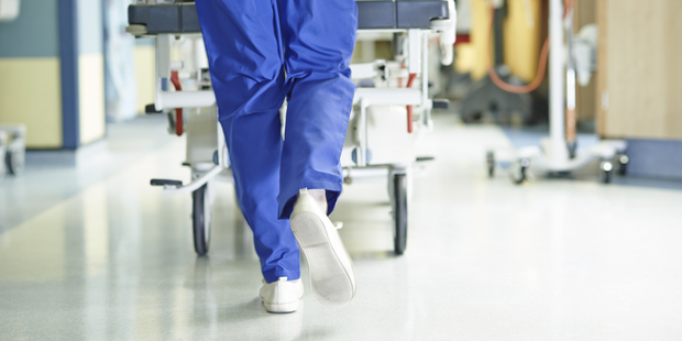 The 57-year-old woman collapsed while she was being escorted in handcuffs from the hospital in Florida. Photo / Getty