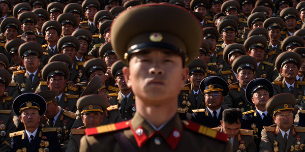 A North Korean soldiers stands before spectators during a mass military parade at Kim Il-Sung square in Pyongyang. Photo / Getty