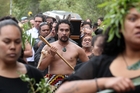 Members of Kahurangi Maori Dance Theatre lead Tama Huata to his final resting spot at Whenuakura Urupa, overlooking the Heretaunga Plains. Photo / Duncan Brown Members of Kahurangi Maori Dance Theatre lead Tama Huata to his final resting spot at Whenuakura Urupa, overlooking the Heretaunga Plains. Photo / Duncan Brown