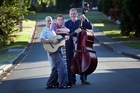 Music teachers Hedley Timbs, Leon Gray and Paul Henderson all moved into the same street. Photo / Andrew Warner Music teachers Hedley Timbs, Leon Gray and Paul Henderson all moved into the same street. Photo / Andrew Warner