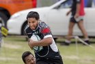 DETERMINED:Rangataua's Ross Taurima heads for the tryline. DETERMINED:Rangataua's Ross Taurima heads for the tryline.