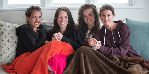 A group of school friends from Mount Albert Grammar are glad to be home (From left - Megan Laxon, Hannah Dowsett, Alicia Barrington and Tara Davey). Photo / Jason Oxenham