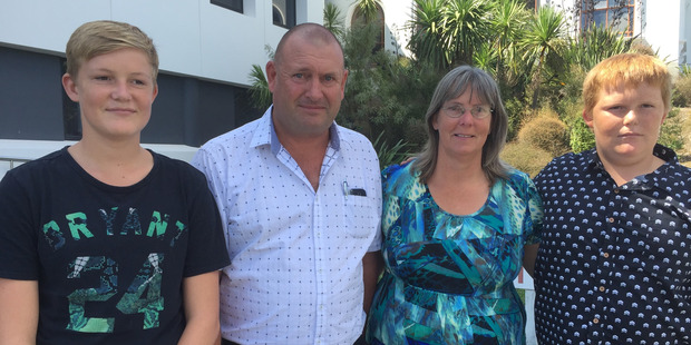 Amie Russell's family, from left brother Hayden, father Darrell, mother Catherine, and brother Liam, outside the Hamilton District Court after the inquest into her death. Photo / Belinda Feek